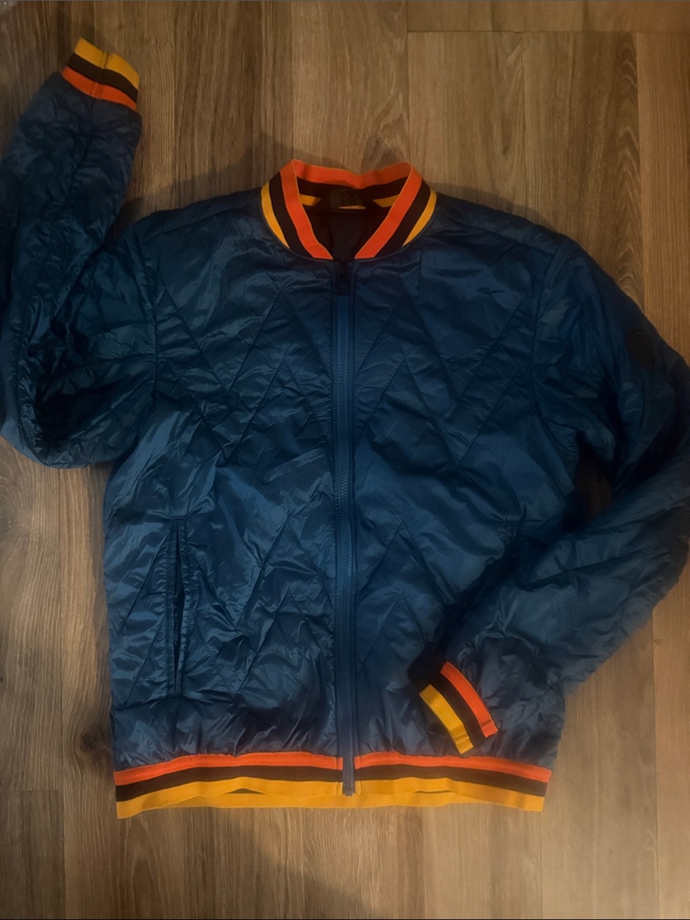 Helly Hansen Navy Quilted Bomber Jacket with Orange & Yellow Trim